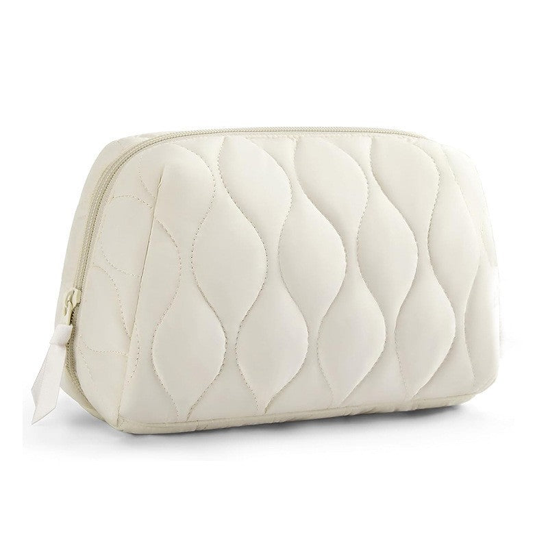 Cosmetic organizer bag with luxurious wave pattern Bowlift