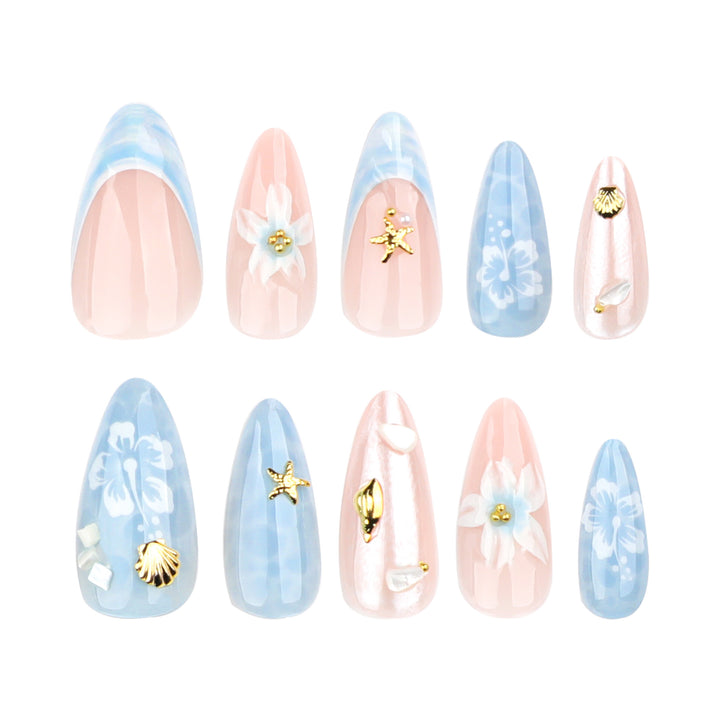 Elegant nail art in maritime design with glitter and 3D accents Bowlift