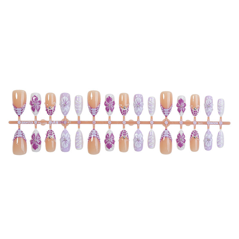 Artificial nail set with elegant flower designs and glitter accents Bowlift
