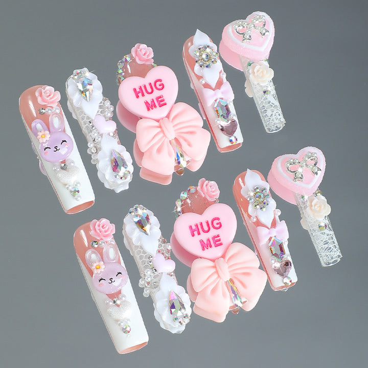 Creative nail art set with playful animal and heart motifs Bowlift