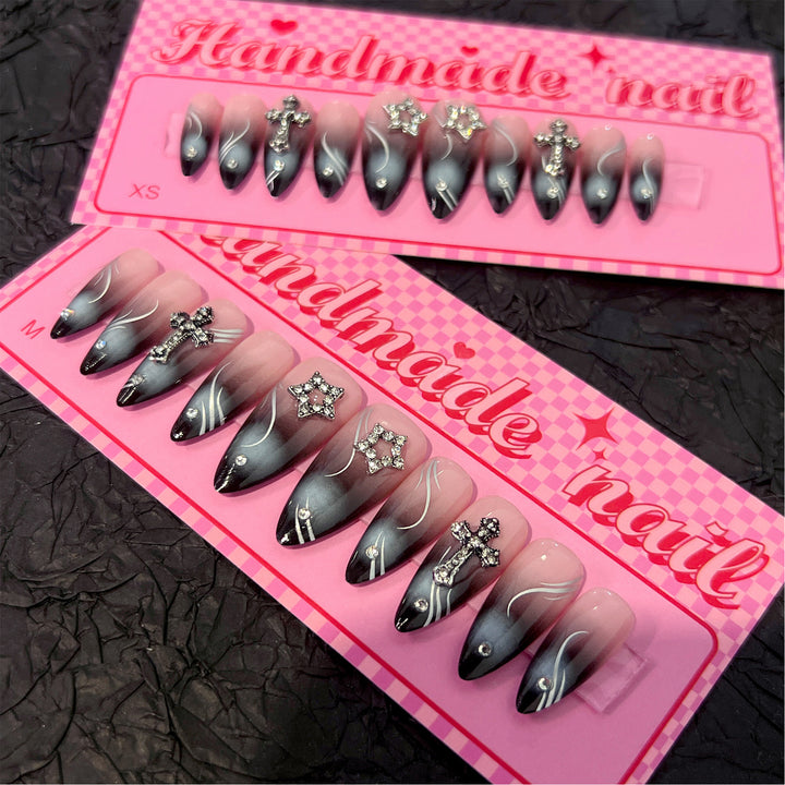 Artistic stiletto nails with elegant glitter design Bowlift