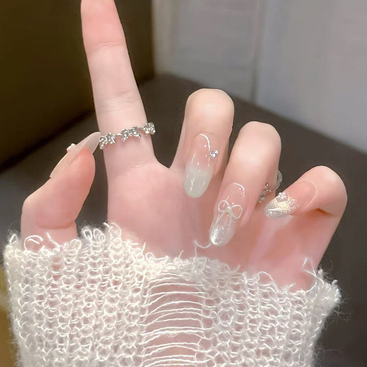 Artistic Press-On Nail Set with Bow and Floral Details Bowlift