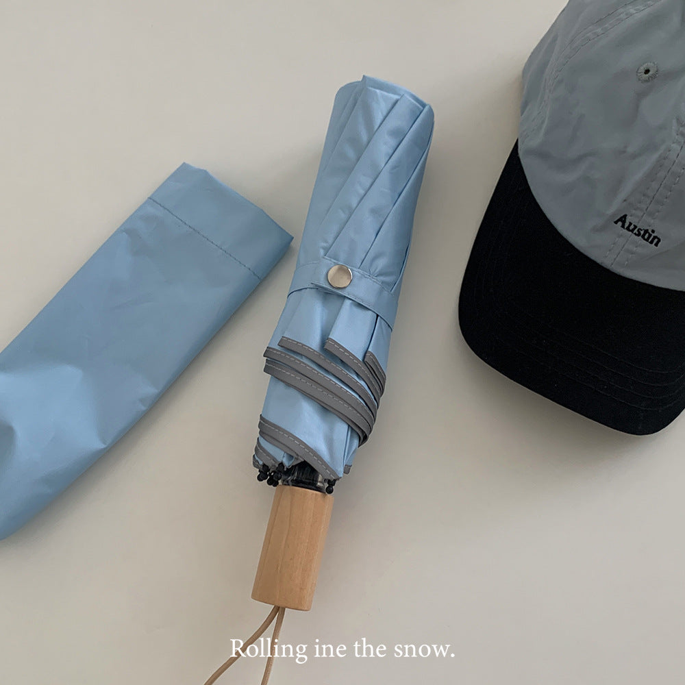 Women's automatic folding umbrella with elegant design and ergonomic wooden handle Bowlift