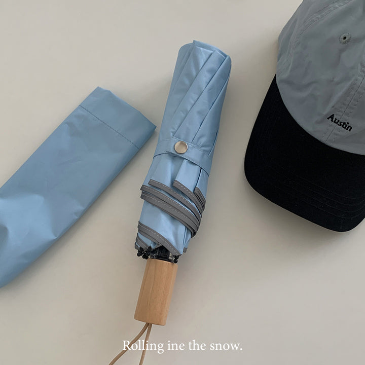 Women's automatic folding umbrella with elegant design and ergonomic wooden handle Bowlift