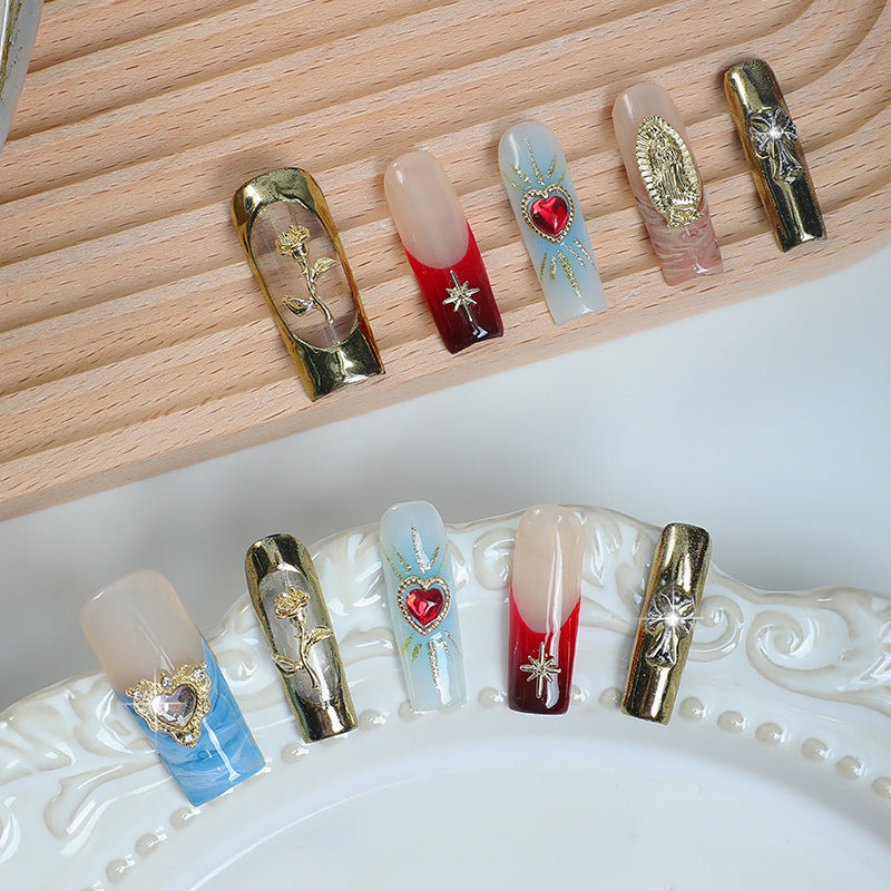 Artificial nail set with cherry motif and sparkling rhinestones Bowlift