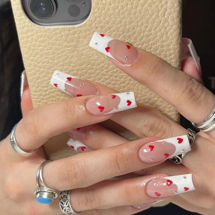Creative nail art with heart design Bowlift