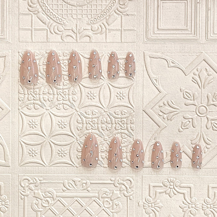Decorative Stiletto Press-On Nails with Rhinestone Accents Bowlift