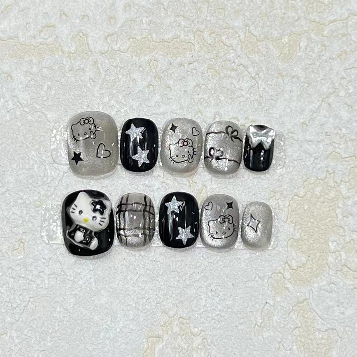 Fun and Whimsical Press-On Nail Set with Cartoon Accents Bowlift
