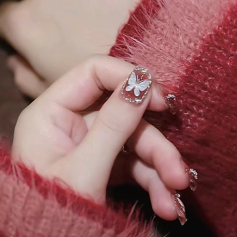 Glamorous Press-On Nail Set with Decorative Gemstone Accents Bowlift