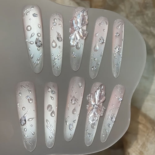 Glamorous artificial nails with sparkling accents Bowlift