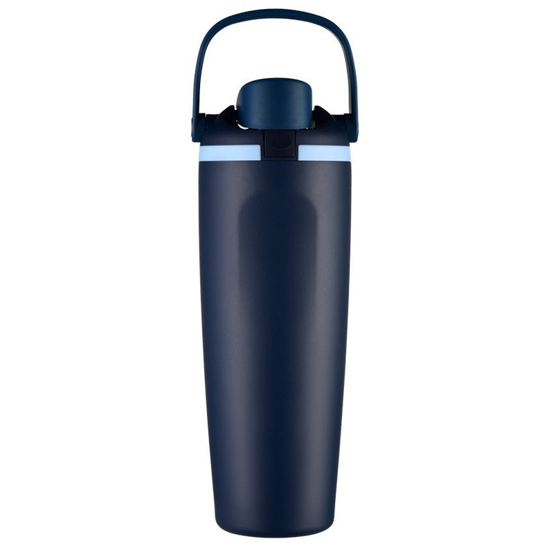 Unisex double-walled vacuum drinking bottle made of stainless steel with one-handed click closure and carrying handle Bowlift