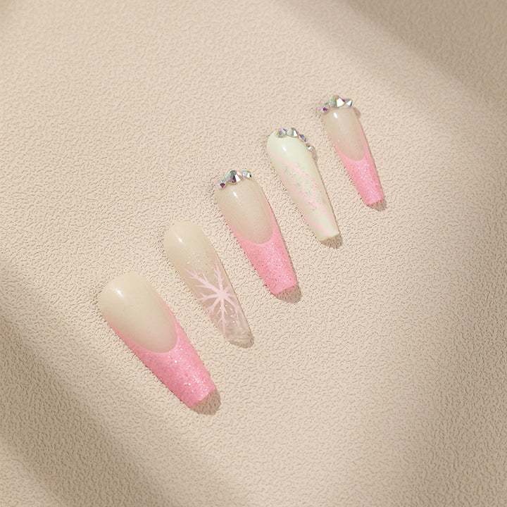 Artistic stiletto nails with glitter and snowflake design Bowlift