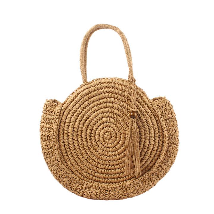 Round basket bag with elegant tassel Bowlift