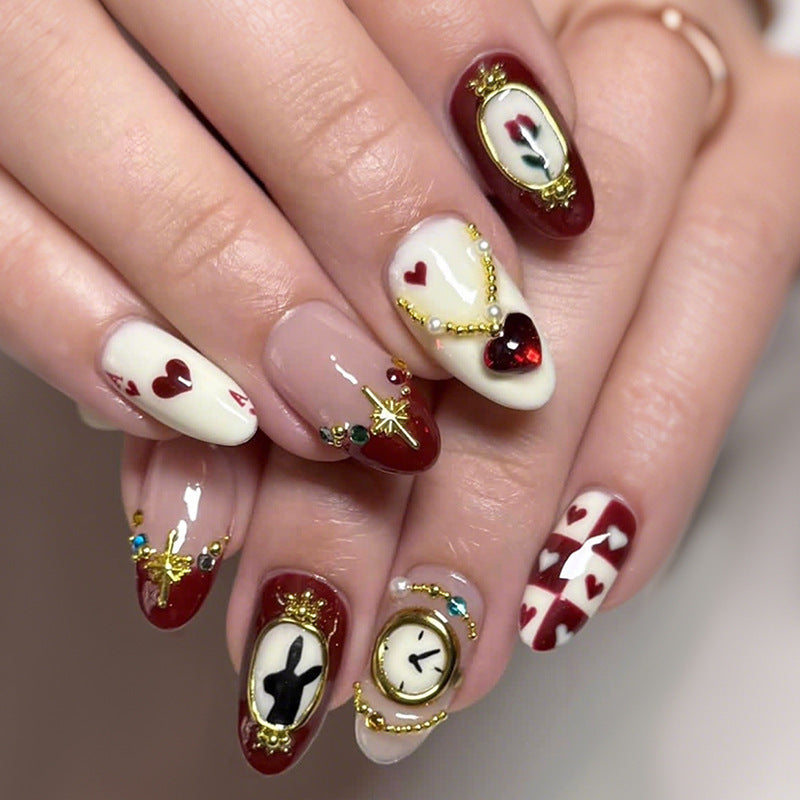 Creative nail art set with playful heart and clock motifs Bowlift