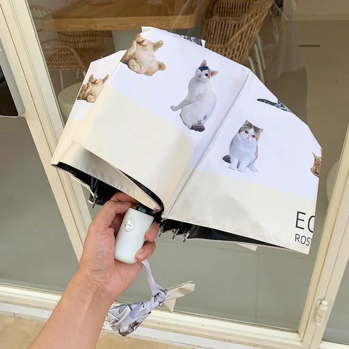 Ladies folding umbrella with playful animal design Bowlift
