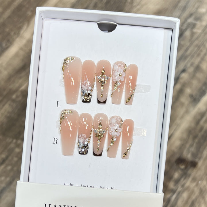 Artistic Reusable Press-On Nail Set with Floral and Gold Accents Bowlift