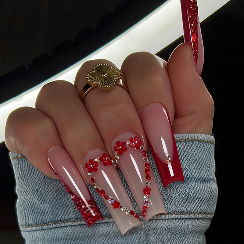 Artificial nail set with luxurious accents and elegant designs Bowlift