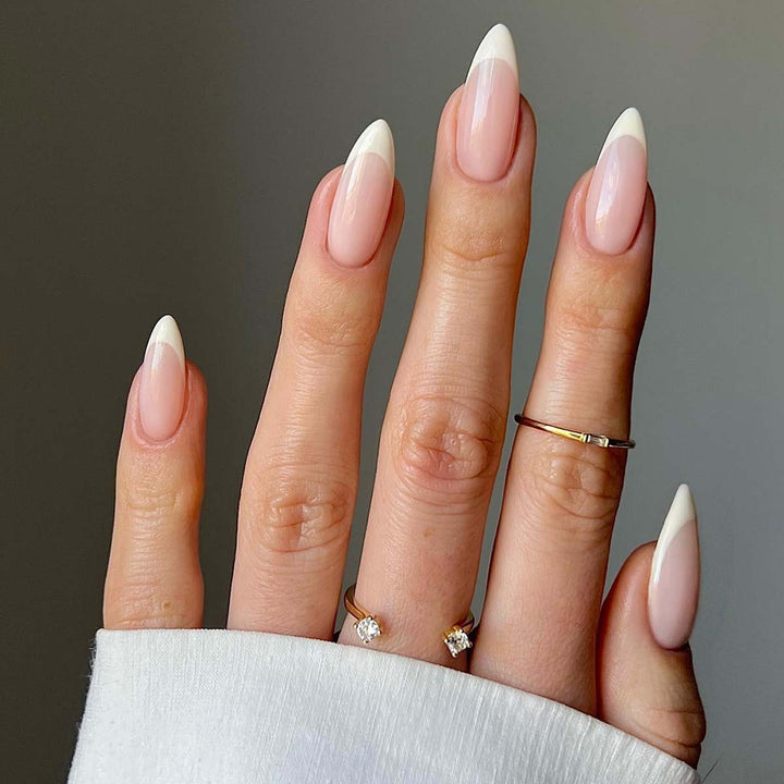 Elegant stiletto nails with French design Bowlift