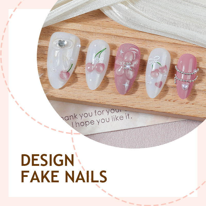 Artificial nail set with decorative floral motifs and glamorous accents Bowlift