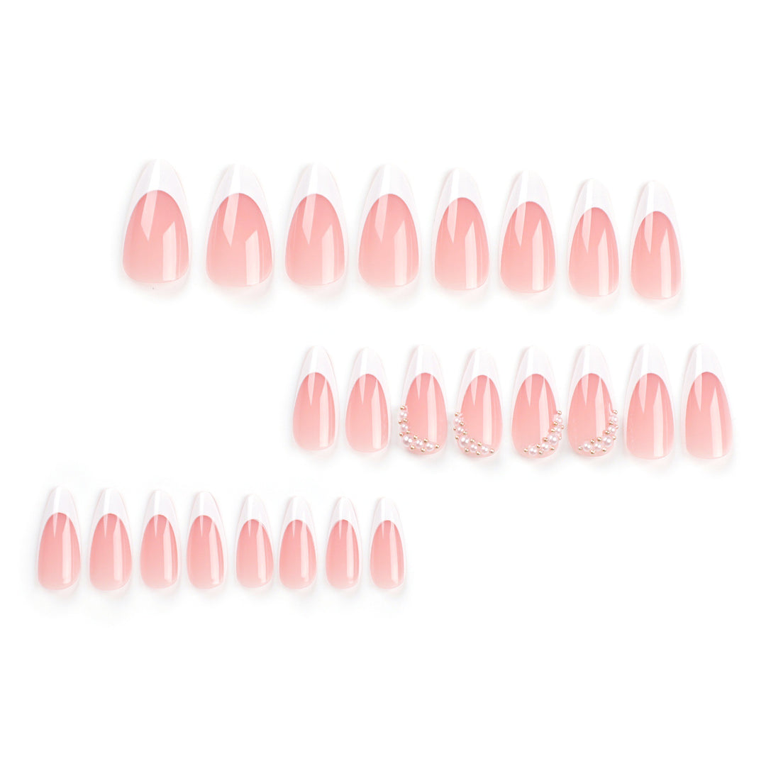 Artificial nail set with elegant French lace and pearl-decorated accents Bowlift