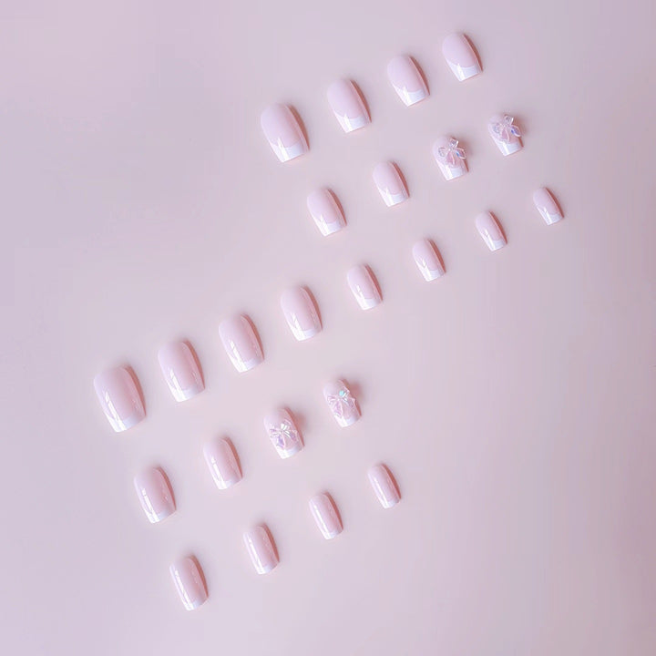 Acrylic nail set with elegant French tips and 3D details Bowlift