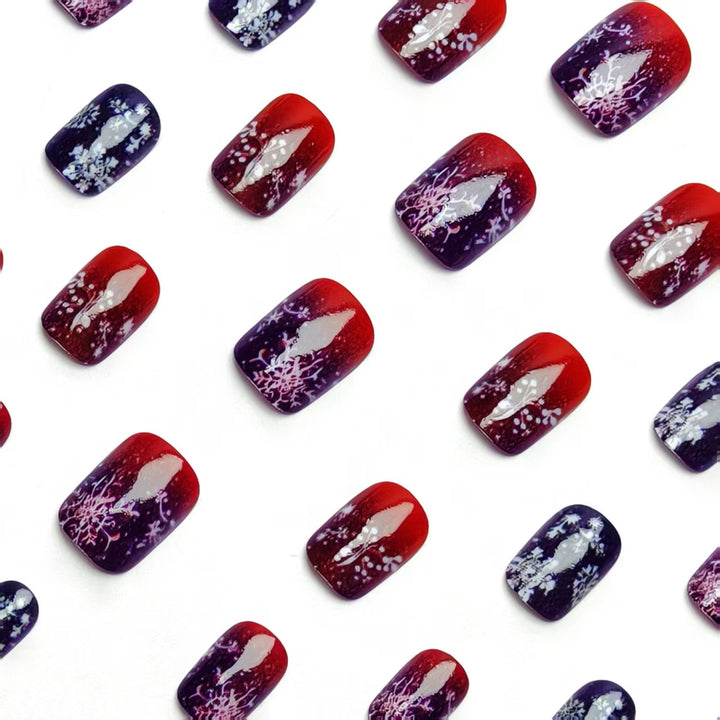 Artificial nails with festive glitter effect and wintry snow motif Bowlift
