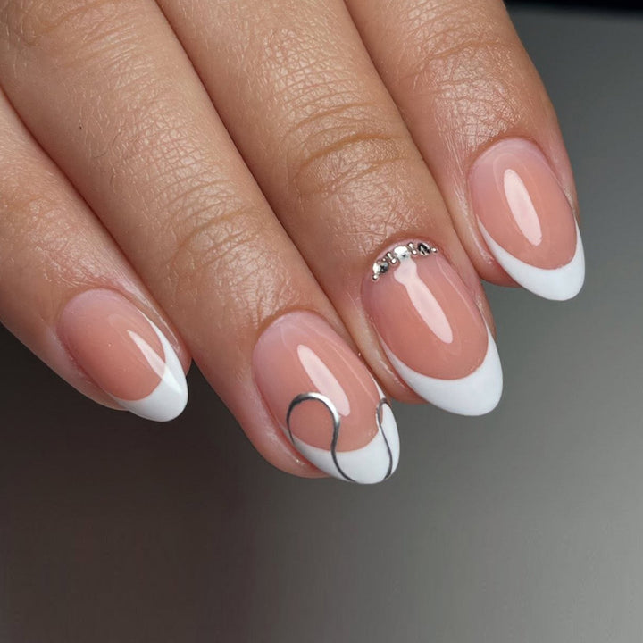 Elegant French Tip Press-On Nail Set with Decorative Accents Bowlift