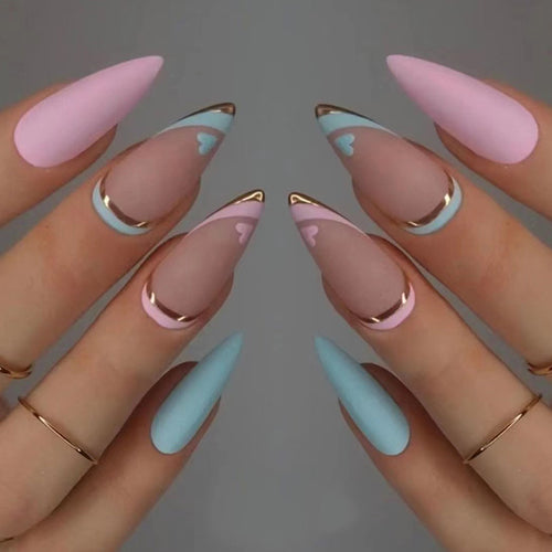 Artistic stiletto nails with gold accents and heart design Bowlift
