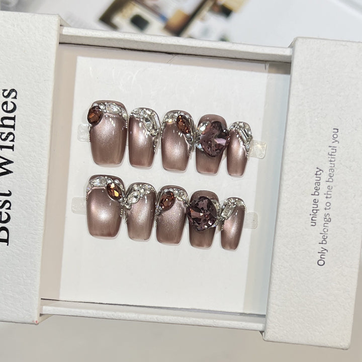 Decorative Press-On Nail Design with Gemstone Accents Bowlift