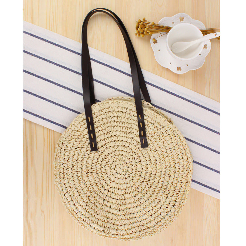 Round basket bag with sturdy leather handles Bowlift