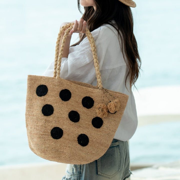 Handcrafted straw bag with eye-catching accents Bowlift