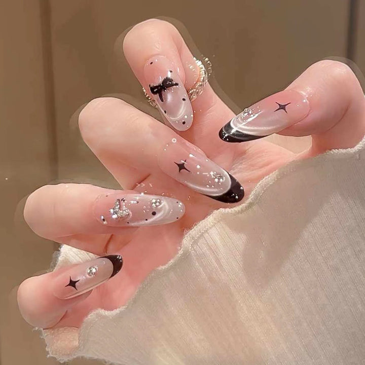 Glamorous artificial nail tips with 3D flower and crystal embellishments Bowlift