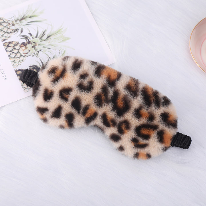 Women's cuddly faux fur sleep mask with heart-embossed surface and gathered comfort band Bowlift
