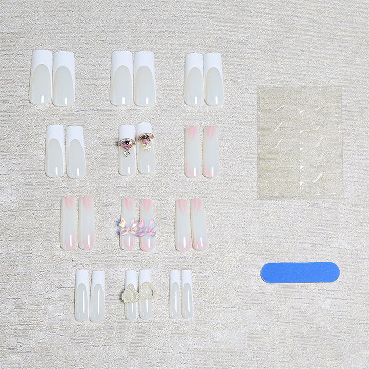 Artificial nails with delicate embellishments Bowlift