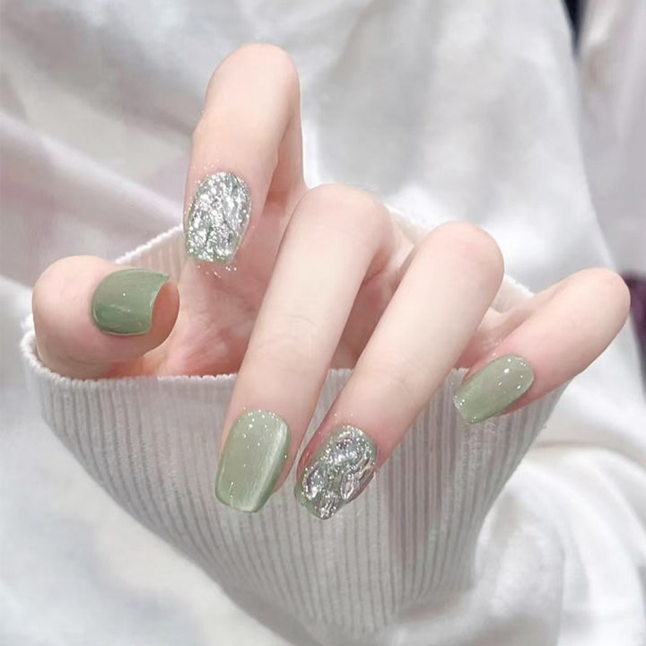 Acrylic nail set with elegant glitter design and creative effects Bowlift