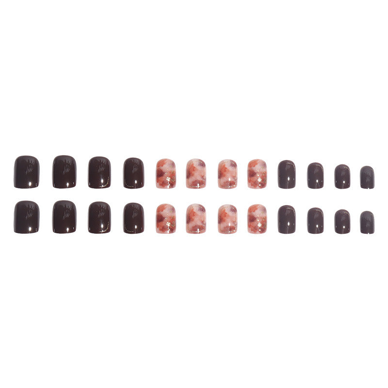 Artistic Press-On Nail Set with Marble and Metallic Accents Bowlift