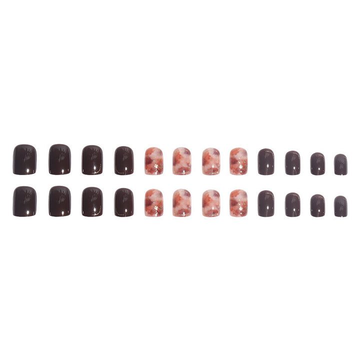 Artistic Press-On Nail Set with Marble and Metallic Accents Bowlift