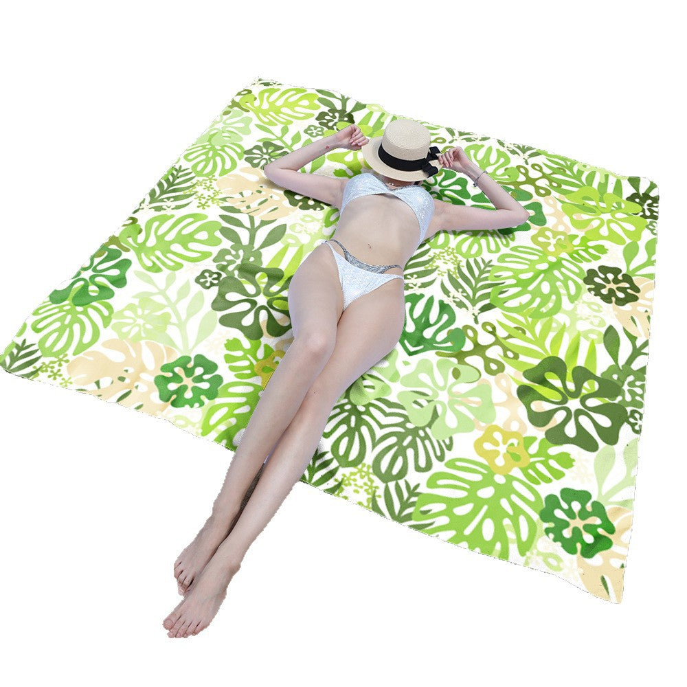 Beach blanket with tropical floral design Bowlift