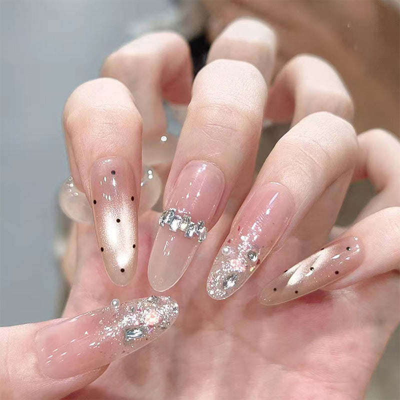 Artificial nail set with sparkling glitter and elegant jewelry details Bowlift