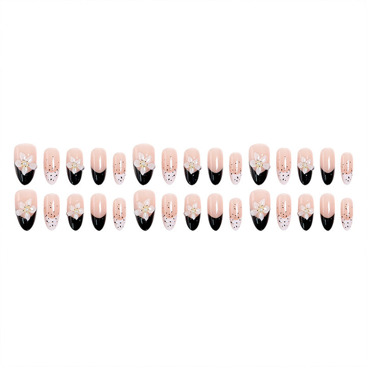 Artful nail tips with floral embellishments Bowlift