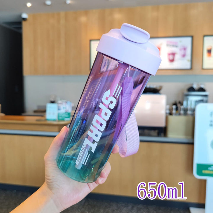 Women's sports water bottle with practical straw and carry function Bowlift