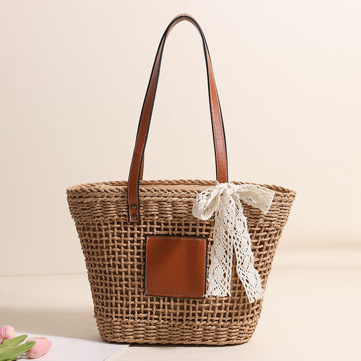 Handmade straw bag with elegant leather accents Bowlift