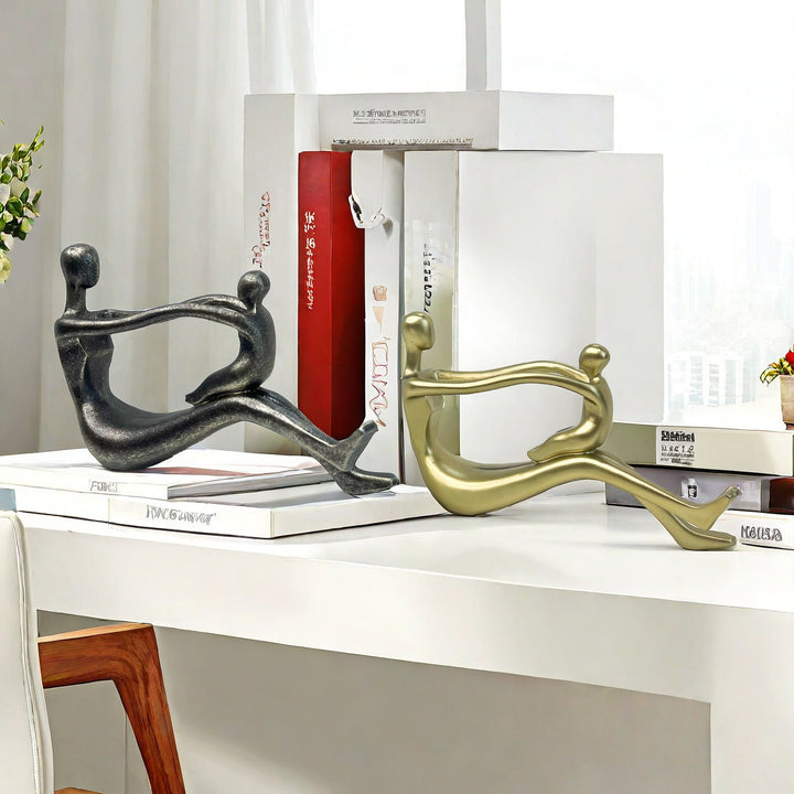 Stylish sculpture with intertwined figures Bowlift