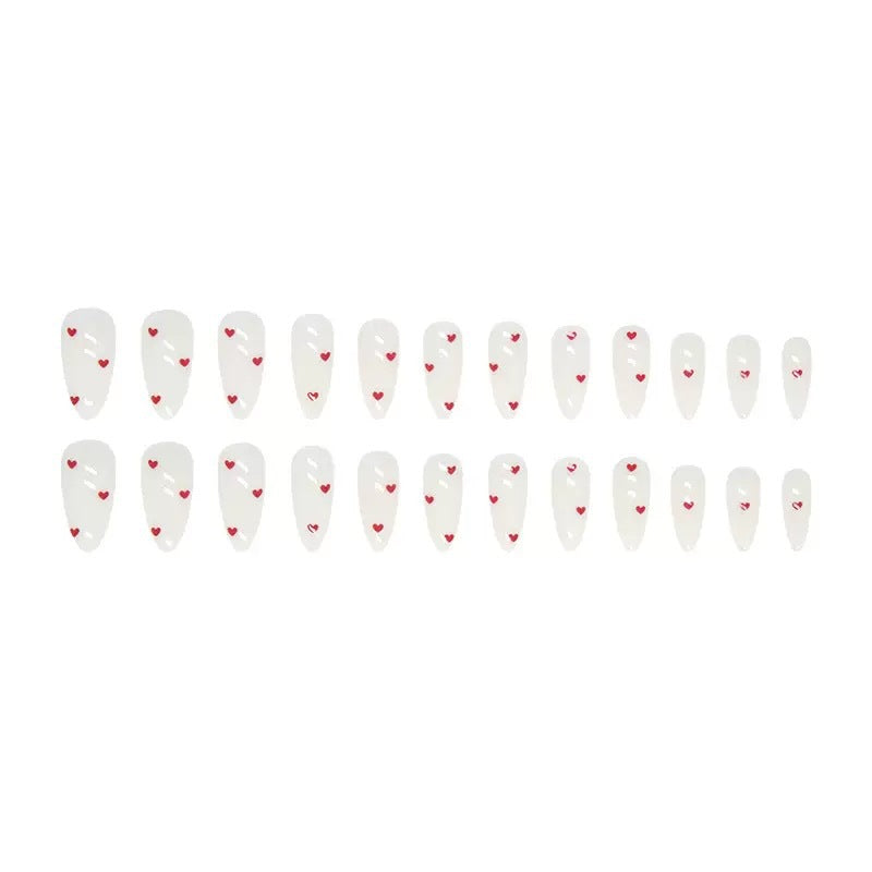Nail set with playful heart design and elegant finish Bowlift