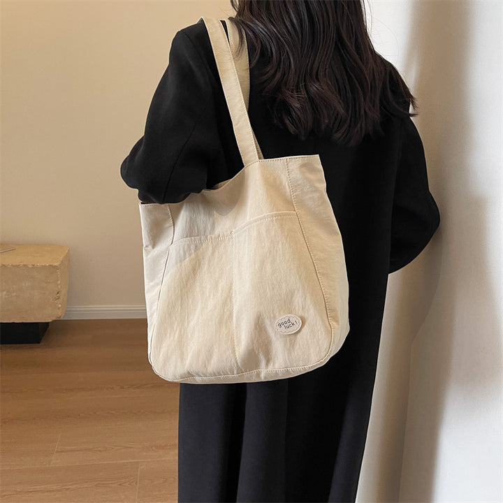 Multi-Pocket Utility Tote Bowlift