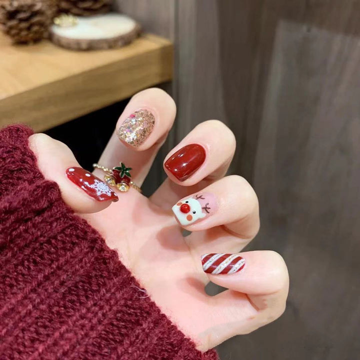 Artificial nail design with festive Christmas motif Bowlift
