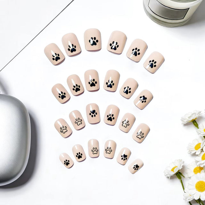 Fake nails with cute paw print design Bowlift