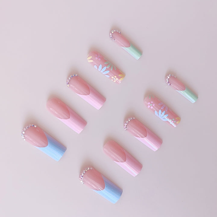 Artificial nail set with floral 3D embellishments and rhinestone accents Bowlift