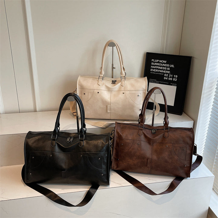 Elegant and Spacious Travel Bag Made of Durable Faux Leather Bowlift