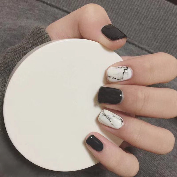 Artificial nail set with luxurious marble design and elegant high-gloss finish Bowlift